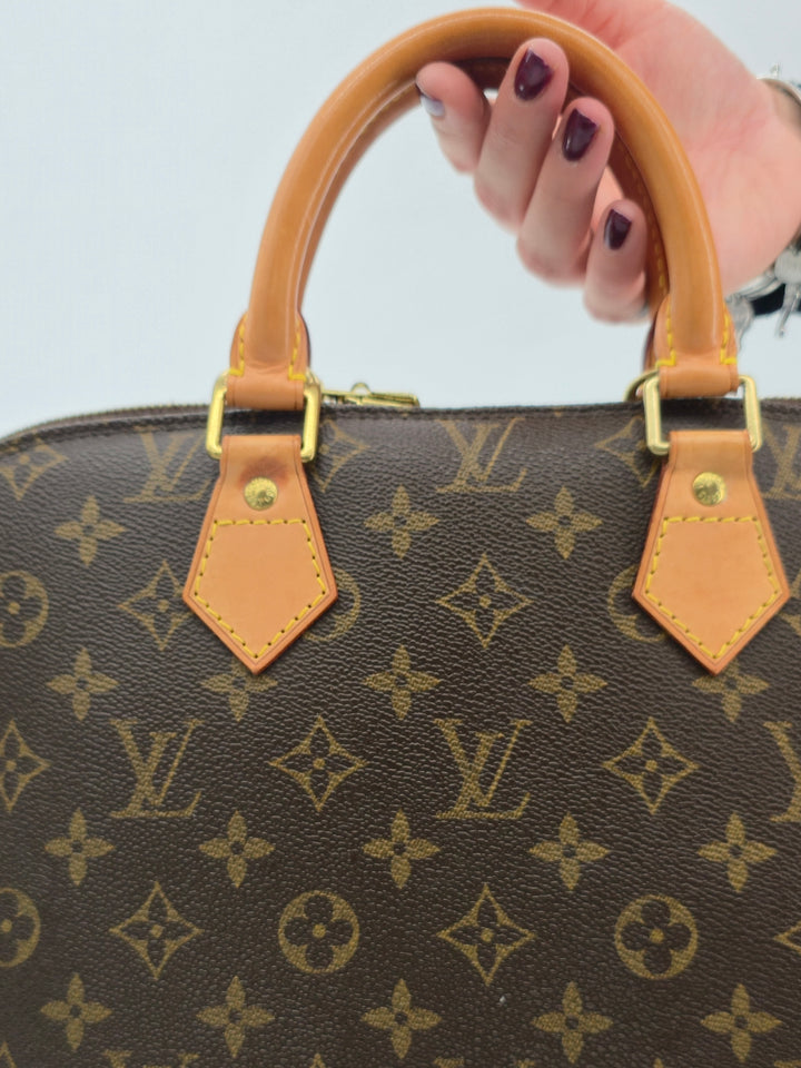 LOUIS VUITTON ALMA PM