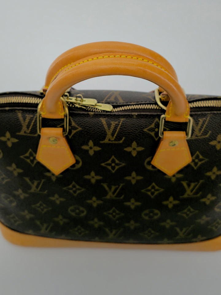 LOUIS VUITTON ALMA PM