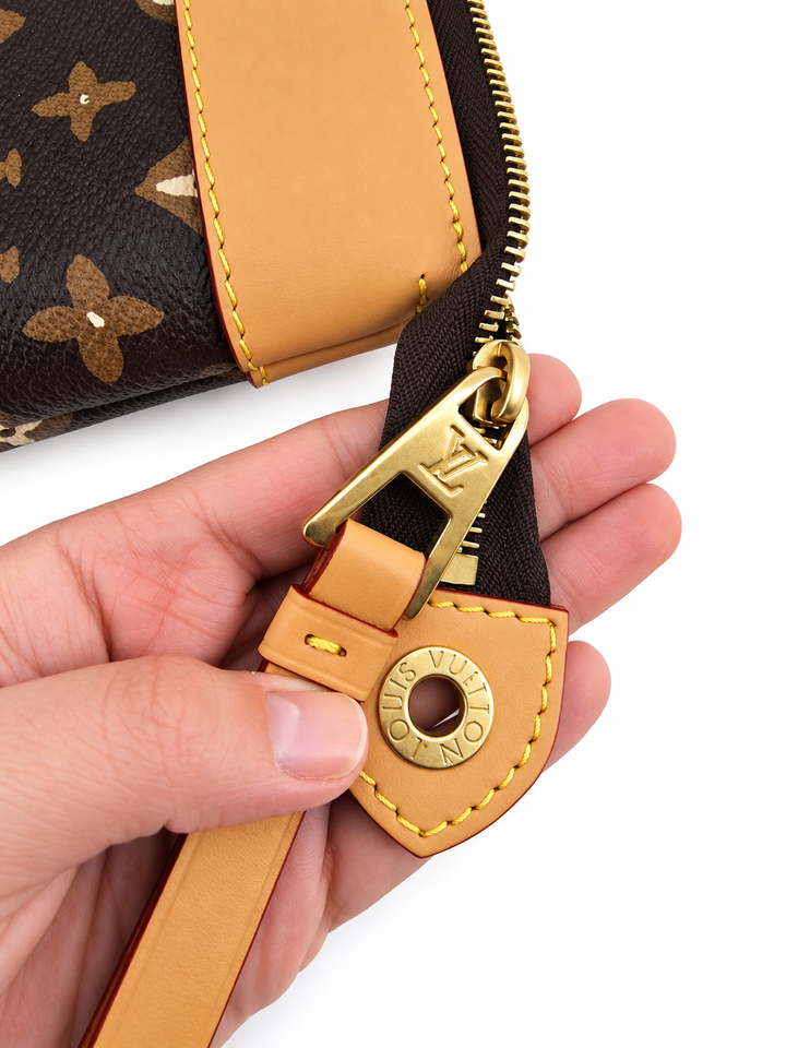 Louis Vuitton
x Tyler the Creator Voyage Souple pochette Limited Edition