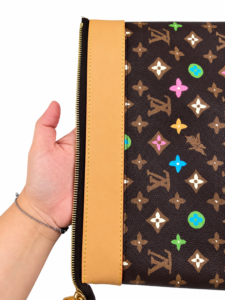 Louis Vuitton
x Tyler the Creator Voyage Souple pochette Limited Edition
