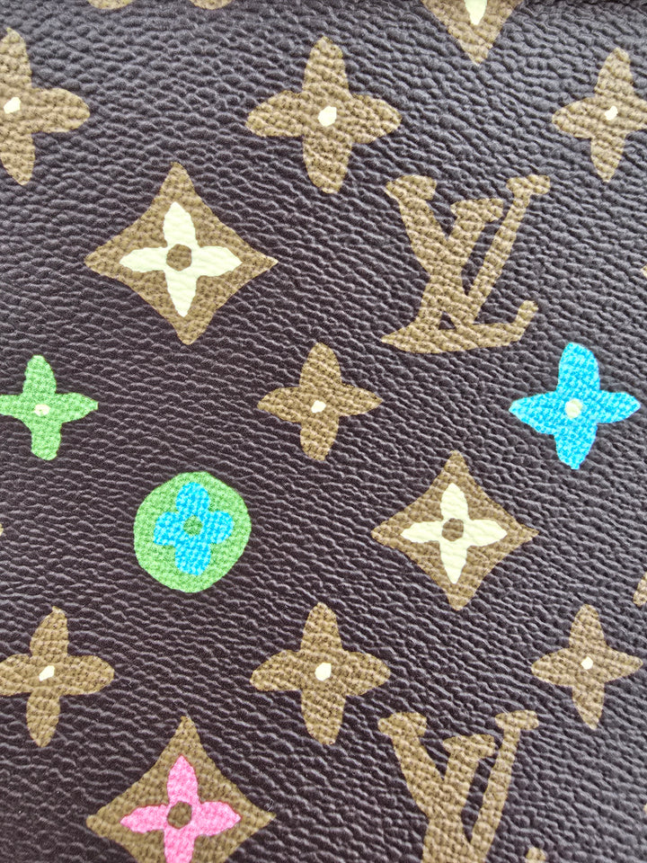 Louis Vuitton
x Tyler the Creator Voyage Souple pochette Limited Edition